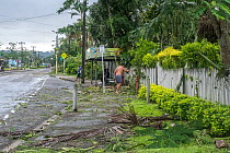A man cleaning the streets of Lami Town the morning after  Topical Cyclone Winston made landfall in Fiji. Cyclone Winston was the strongest cyclone ever to make landfall in the southern hemisphere, Su...