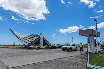 A destroyed petrol station, the aftermath of tropical Cyclone Winston, Ba Province, Viti Levu, Fiji. February, 2016.
