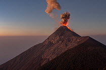 Lava and ash erupting from Fuego Volcano at dawn, one of the most active volcanoes in Guatemala, viewed from Acatenango Volcano, Guatemala. 4th March, 2023.