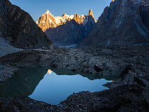 Glacial moraine on the Baltoro Glacier at dawn, Karakoram Mountains, Gilgit-Baltistan, Northern Pakistan. July, 2022.