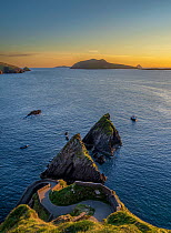 Sunset from Dunquin Pier looking towards the Blasket Islands, Dingle Peninsula, County Kerry, Republic of Ireland. September, 2022.
