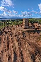 Sandstone outcrop at viewpoint on Thurstaston Hill looking across the River Dee Estuary to North Wales, Merseyside, UK. September, 2022.