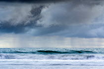 Storm clouds over the ocean viewed from Playa El Almejal, Bahia Solano, Choco, Colombia, Pacific Ocean. July, 2022.