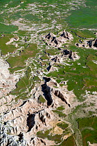 Aerial view of rocky landscape in Badlands National Park National Park, South Dakota, USA. June, 2022.
