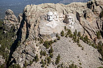 Aerial view of the carved faces of Presidents Washington, Jefferson, Roosevelt and Lincoln at Mount Rushmore National Memorial, South Dakota, USA. June, 2022.