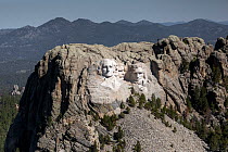 Aerial view of the carved faces of Presidents Washington, Jefferson, Roosevelt and Lincoln at Mount Rushmore National Memorial, South Dakota, USA. June, 2022.