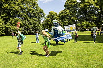 Goddess of the Wye puppet procession, part of the Save the Wye Campaign to raise awareness of pollution levels in the River Wye, Chippenham Fields, Monmouth, Wales, UK. 9th July, 2023.