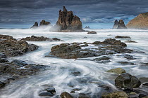 Seawater surrounding rocks, Benijo Beach, Anaga Peninsula, Tenerife, Canary Islands, Atlantic Ocean. March, 2022.