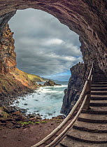 Steps leading down through cave to Nogales Beach, La Palma, Canary Islands. March, 2022.