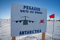 Sign for American Pegasus White Ice Runway, an aircraft runway that operates in summer on the Ross Ice Shelf, McMurdo Sound, Ross Sea, Antarctica.