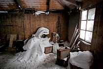 Snow fills a corner of Scott's Antarctic Expedition hut, McMurdo Sound, Ross Island, Antarctica.