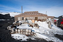 People visiting Shackleton's Hut, Cape Royds, Ross Island, McMurdo Sound, Ross Sea, Antarctica.