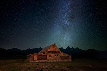 Starry night over Moulten Barn in Mormon Row historic district, Grand Teton National Park, Wyoming, USA. October, 2022.