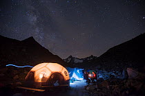 Tents lit up at night with scientists with the GLORIA project that studies alpine plants and their reaction to a warming climate, working late into the night to record the days observations, Schrankog...