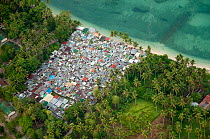 Aerial view of shanty town beside beach, Davao, Mindanao, Philippines, Celebes Sea, March 2007.