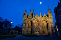 Peterborough Cathedral  with the Early English Gothic faade from 13th Century at dusk, Peterborough, Cambridgshire, England, UK, February 2023.