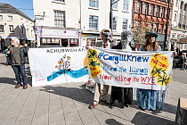 Street theatre representing Avara Cargill, a chicken processing factory company, on trial at Extinction Rebellion Save the Wye Campaign protest, Hereford, Herefordshire, UK, April 8th 2023.