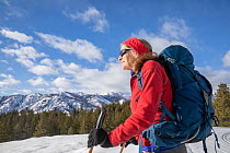 RF - Cross country skier skiing in the Methow Valley, Okanogan Wenatchee National Forest, Washington, USA. February, 2023. Model released. (This image may be licensed either as rights managed or royal...