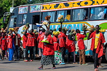 Licensed food vendors selling fruit to tourists on bus, Uganda. February, 2023.