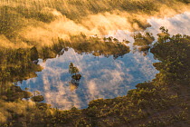 Bog pool at sunrise, Meelva Nature Protection Area, Polvamaa county, Estonia.