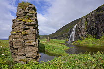 Rock formation and waterfall, Hornvik, Hornstrandir, Westfjords, Iceland. July, 2022.