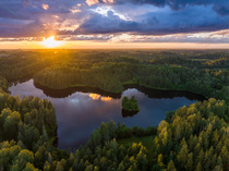 Aerial view of sunset after rainy day over Lake Saarjarv in Vorumaa county, Karula National Park, Estonia.