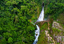 Aerial view of waterfall in tropical, humid forest, Finca Sacmoc, Alta Verapaz, Guatemala. May, 2023.