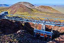 Tourists in the open cable lift preparing for descent into Thrihnukagigur volcano, a dormant volcano now used for tours, Iceland. September, 2023. EDITORIAL USE ONLY.