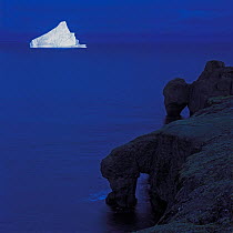 Stranded iceberg in Disko bay at night, Greenland.