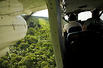 View from aeroplane as its comes in to land at rainforest airstrip near the Karawari River, Foja Mountains, West Papua. August, 2005.