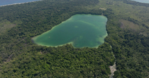 Aerial shot of saltwater lake, island north of New Ireland, Papua New Guinea.
