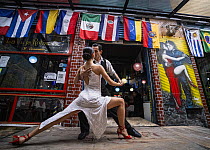 Two dancers performing the tango in the street, El Caminito, Buenos Aires, Argentina. December, 2023.