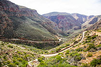 Road winding through Swartberg Pass, Western Cape Province, South Africa. June, 2023.