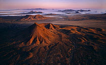 Aerial view of Sierra Hornaday mountains shrouded in mist, Biosphere Reserve of the Pinacate & Gran Desierto Altar, Sonora, Mexico.