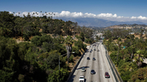 Timelapse of cars using Arroyo Seco Parkway / Pasadena Freeway. This road leads to the financial centre of Downtown Los Angeles, California, USA.