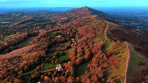 Aerial tracking shot of the Malvern Hills AONB, Herefordshire and Worcestershire, UK.