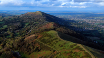 Aerial tracking shot of the Malvern Hills AONB, Herefordshire and Worcestershire, UK.