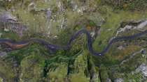 Aerial tracking shot of Cheddar Gorge, Somerset, UK.