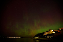 Timelapse of Southern lights / Aurora australis above shore, Hobart, south Tasmania. Global aurora phenomenon on 11th May. 2024. 2024. Timelapse created from stacked stills. A still was taken every th...