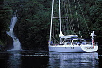 Nosing up to a waterfall in Alaska aboard 88ft sloop "Shaman."
