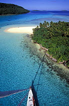 Aerial view from the masthead of the 88 foot sloop "Shaman", of the clear waters of the Vava'u group of islands, Tonga, South Pacific. Property Released.