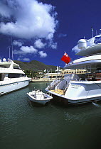 Large motor yachts moored in a marina, Caribbean.