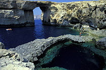 The Azure Window, a stunning and dramatic rock formation on the cliff-lined coast of Gozo, Malta.