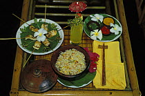 Indonesian food on table with chopsticks, Walea diving resort, Sulawesi, Indonesia.
