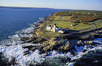 The Beavertail Lighthouse standing near Jamestown on the south end of Conanicut Island, Rhode Island, USA.
