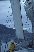 A crew member tending to the sheet aboard "Sariyah", in strong onshore winds and a heavy swell the staysail alone is sufficient to keep the boat moving whilst heading down the coast of Chile towards C...