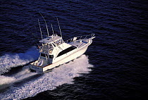 Sportsfishing boat at speed, USA