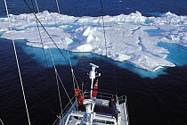 Cruising past icebergs in Spitsbergen aboard 88ft sloop "Shaman". Svalbard Archipelago, Norway, 1998.