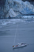 88ft sloop "Shaman" anchored at the foot of a glacier, Kenai peninsula, Alaska. 2001. Property Released.