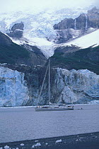 88ft sloop "Shaman" anchored at the foot of a glacier, Kenai peninsula, Alaska, 2001.